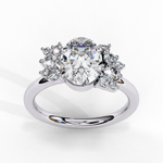 Load image into Gallery viewer, Oval Cut Lab Grown Diamond Engagement Ring with Cluster Side Stones
