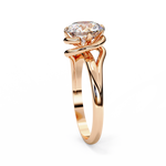 Load image into Gallery viewer, Round Cut Moissanite Engagement Ring | Twisted Rose Gold Solitaire | Ethical &amp; Sustainable Bridal Ring
