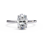 Load image into Gallery viewer, Oval Cut Lab-Grown Diamond Engagement Ring with Hidden Halo | Elegant White Gold Solitaire | Sustainable Luxury Ring
