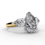 Load image into Gallery viewer, Pear Cut Moissanite Engagement Ring with Pear Side Stones
