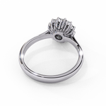 Load image into Gallery viewer, Round Cut Moissanite Engagement Ring With Starburst Halo
