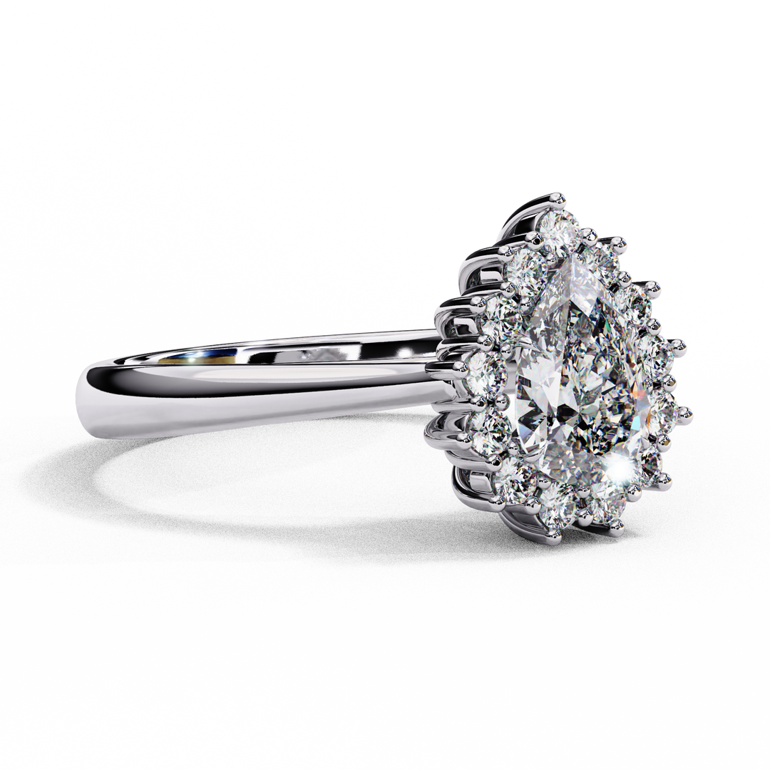 Pear Cut Lab Grown Diamond Engagement Ring With Starburst Halo