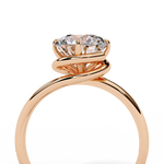 Load image into Gallery viewer, Round Cut Moissanite Engagement Ring | Twisted Rose Gold Solitaire | Ethical &amp; Sustainable Bridal Ring
