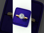 Load and play video in Gallery viewer, Round Cut Moissanite Engagement Ring With Starburst Halo
