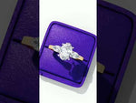 Load and play video in Gallery viewer, Oval Cut Moissanite Engagement Ring with Pear Side Stones
