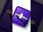 Load and play video in Gallery viewer, Marquise Cut Moissanite Engagement Ring | Marquise &amp; Round Accents
