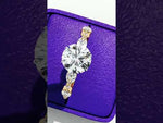 Load and play video in Gallery viewer, Round Cut Moissanite Engagement Ring | Marquise &amp; Round Accents
