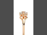 Load and play video in Gallery viewer, Round Cut Moissanite Engagement Ring | Twisted Rose Gold Solitaire | Ethical &amp; Sustainable Bridal Ring
